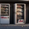 Hoți cu "flexul" la un automat de țigări în Germania: Unul a fost prins, celălalt și-a pierdut telefonul la fugă