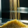 Descoperire Științifică Surprinzătoare: Accelerator de Particule Folosit pentru Rețeta Perfectă de Spaghetti